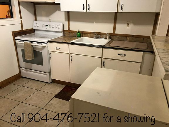 Spacious kitchen with ample cabinets