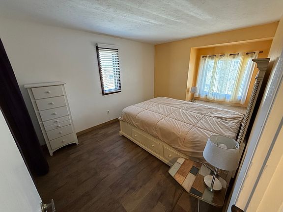 Queen bed, dresser, night stands and lamps.
Lots of warmth in this room with paid heat!