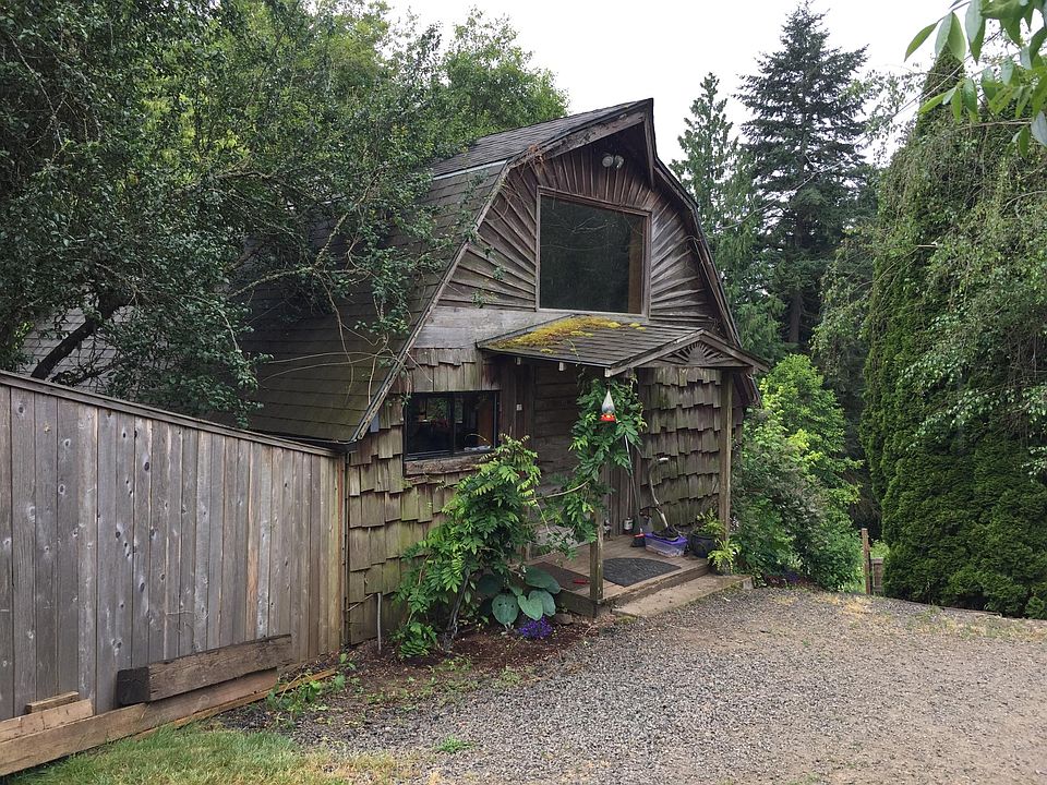 Gambrel roof with attached yard.