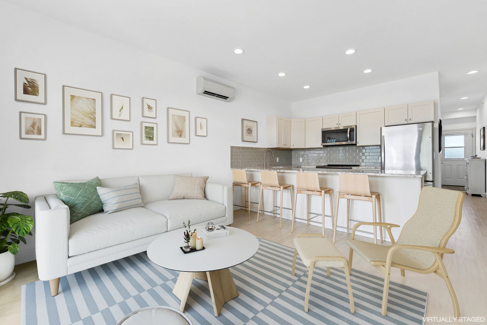  Living room and kitchen. Virtually staged.