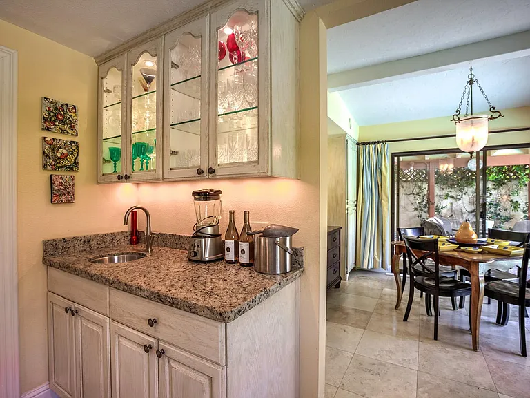 Crystal closet and view to breakfast room.