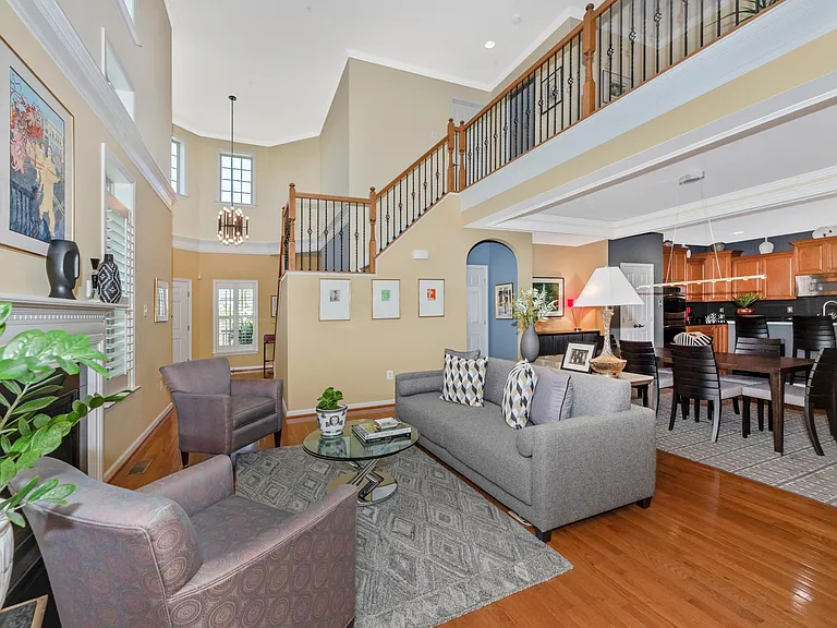 The 2 gray arm chairs are no longer at this property