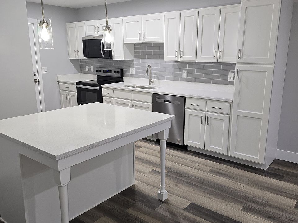 Kitchen with Quartz Countertops and Island