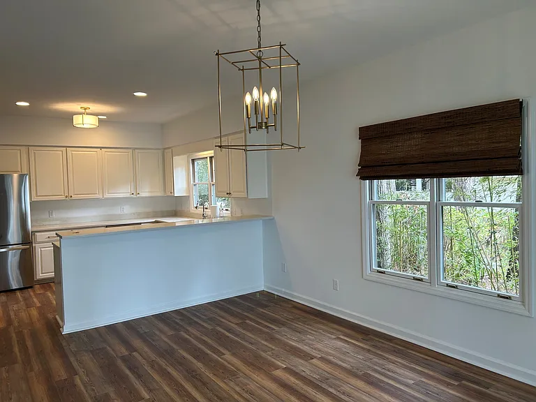 Open kitchen / dining room overlooking the river
