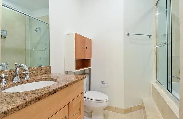 Primary BA (older photo - tub has been remodeled and is now a beautiful tiled shower)