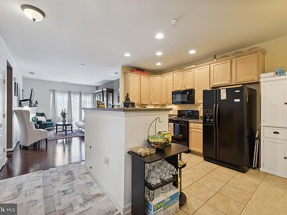 4th image of 9710 Handerson Pl Unit 203