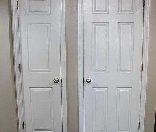 Two closets adjoining the kitchen definitely earn their keep _ see next photo. . . .
