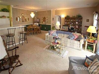 The dining room has wanescotting with a chair rail.
