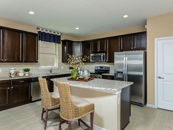 Ktichen with Island & 42 inch Maple Cabinets with Crown Molding