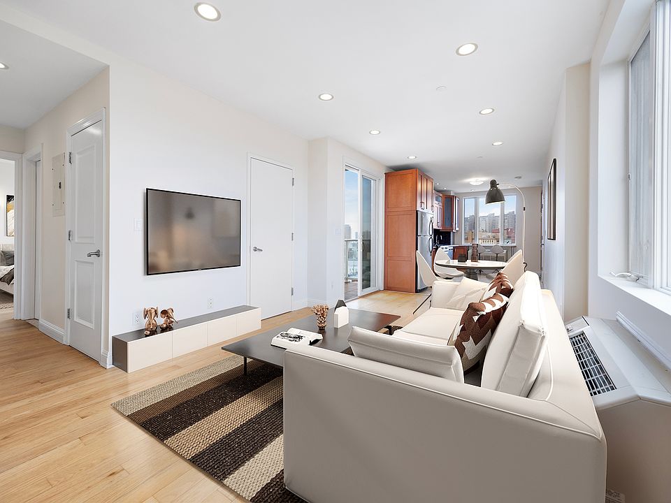 a room with a sink and a mirror