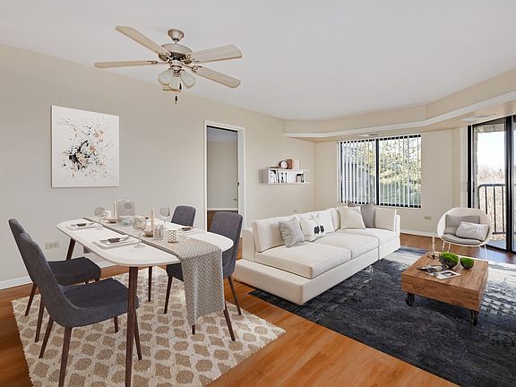 Open living room layout with an abundance of natural light.