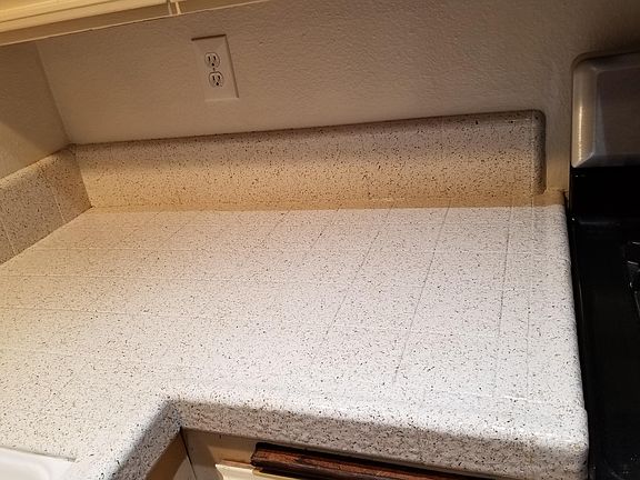 Kitchen counter tops are beautiful ceramic tiled