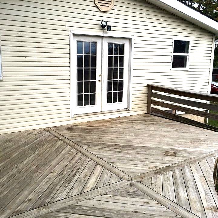Back of the house w/ a deck