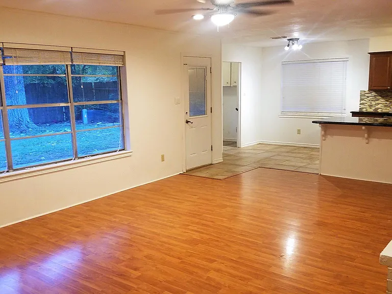 Watch the kiddos in the back yard from the living room. Excellent Open Concept.