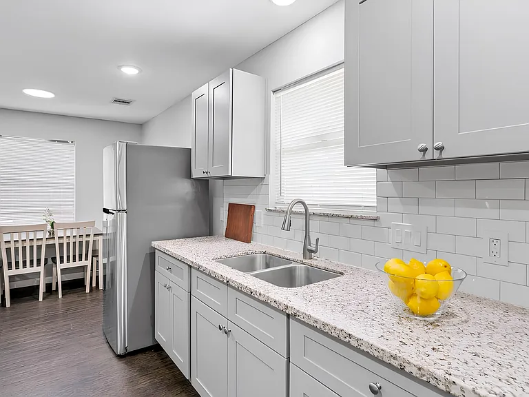 Beautiful upgraded granite countertops. Live in modern luxury!