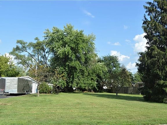 Almost 1/2 acre yard & fairly open for use as you wish. Great for gardening, pets & yard recreation of all kinds.