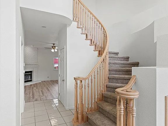 Stairway and passage to family room and laundry room