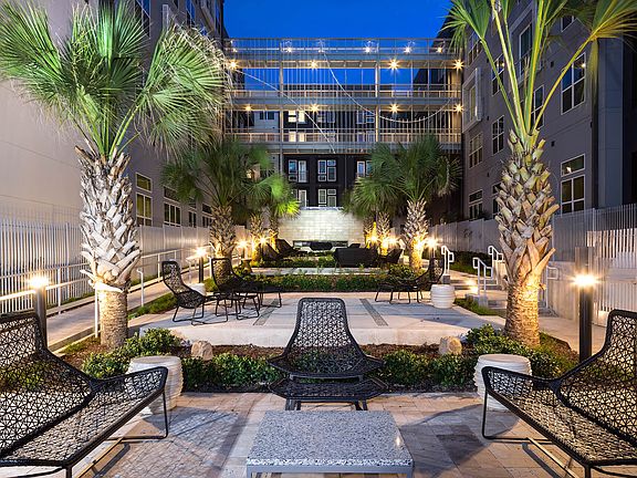 Spend time outdoors in the courtyard, with comfortable seating perfect for soaking in the atmosphere.