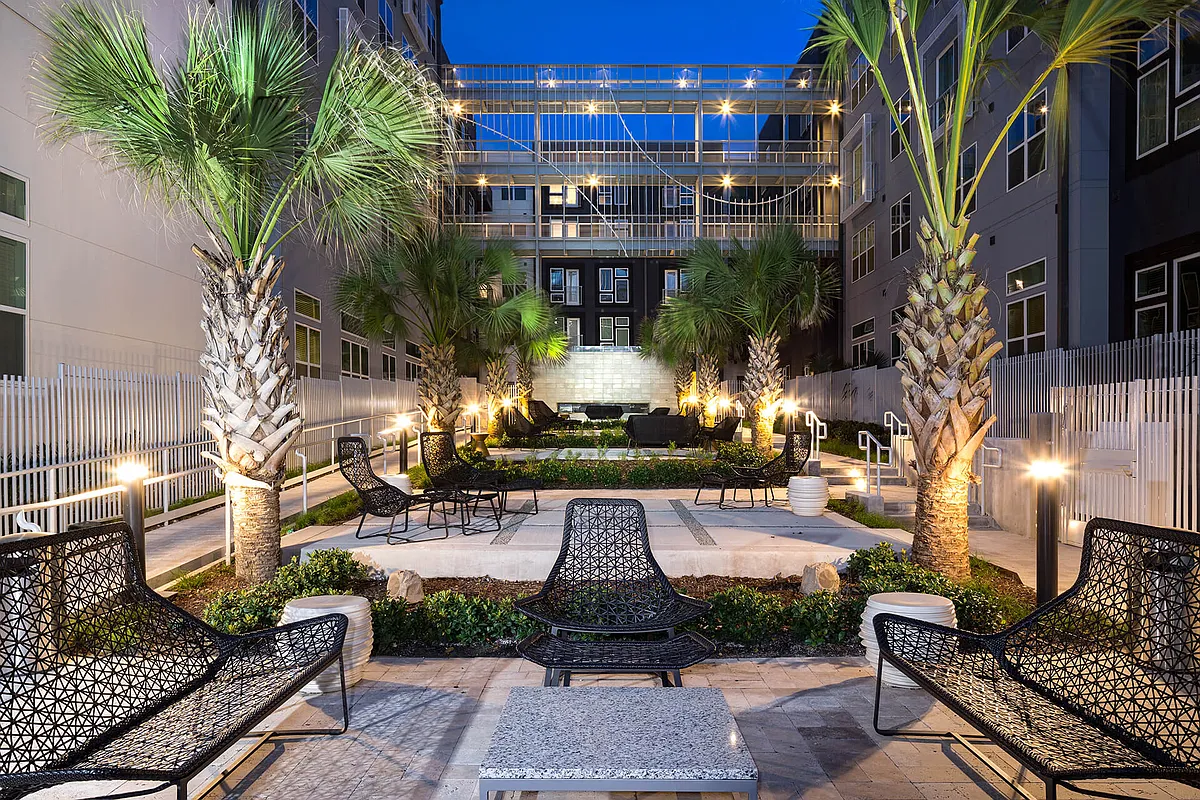 Spend time outdoors in the courtyard, with comfortable seating perfect for soaking in the atmosphere. - Windsor Metro West
