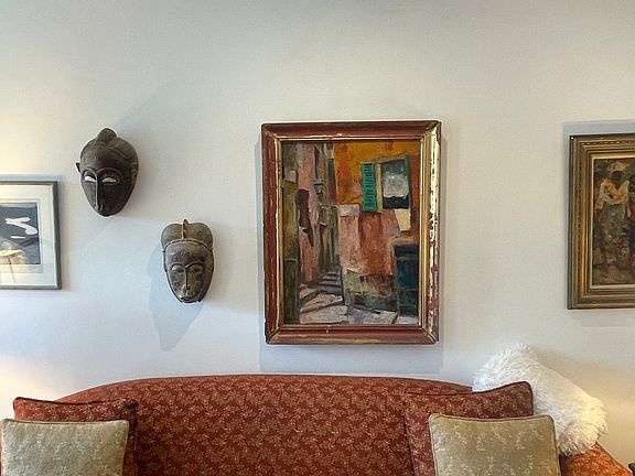 Paintings over sofa in living room
