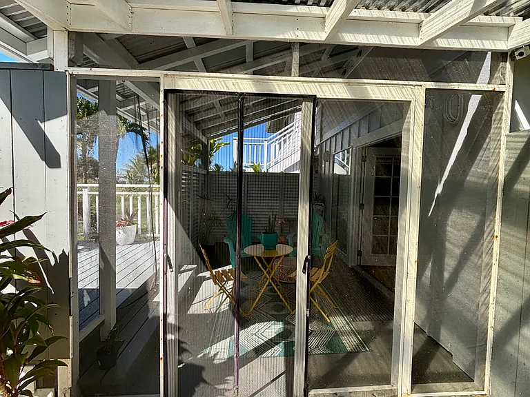 Private covered entry accessed from private driveway parking.