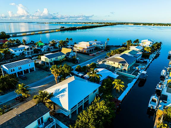 Close to the Atlantic & Gulf with deep access. House roof is the white roof at the bottom of the picture, 4 house from open water Pine Channel