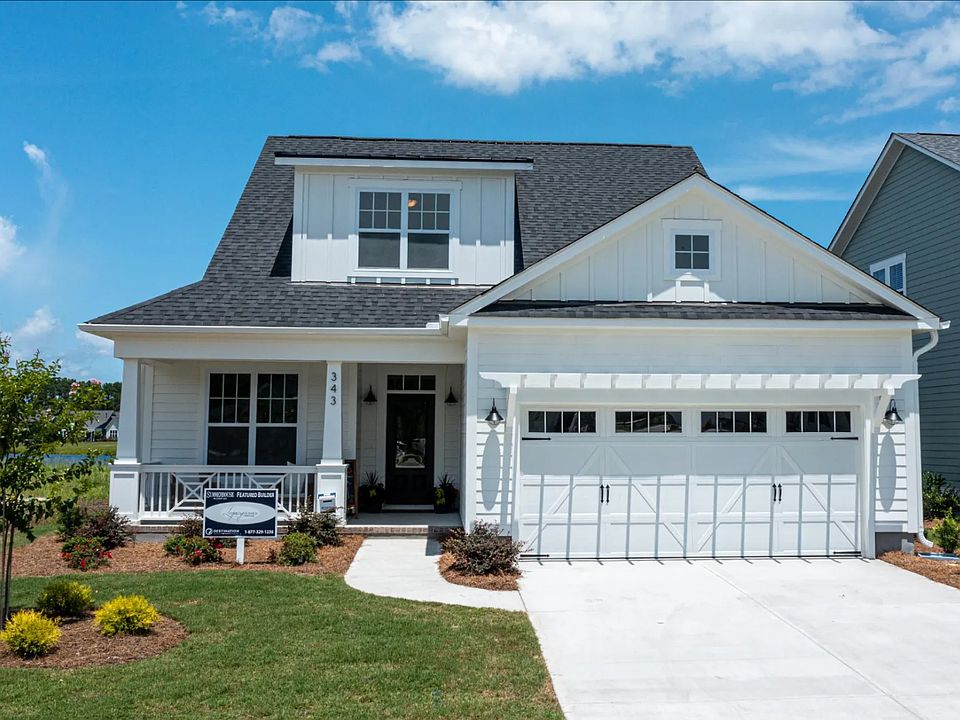 Fletcher Plan model home photo. Our home sits on a larger lot.