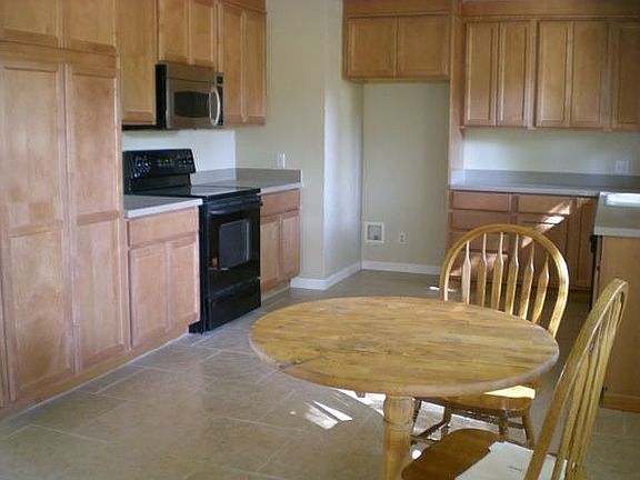 Maple Cabinet/Tile floor