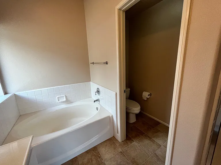 Large soaker tub and private commode