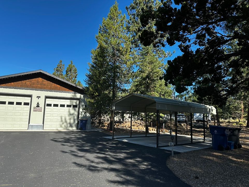 Covered parking in the front of the house.