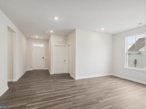 View to from fire place towards the hallway and main door