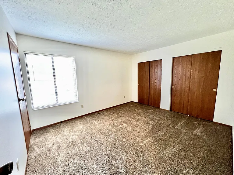 2nd bedroom with 10ft closet space plus a 3rd closet for hanging and had large 2 large shelves for storage.