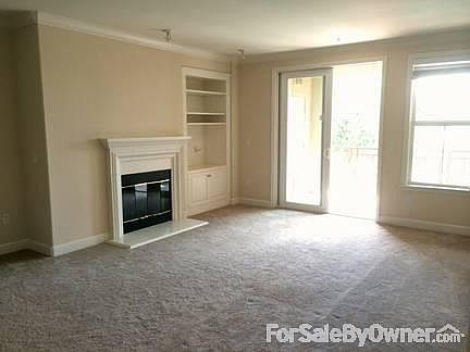 Spacious living area
						:
						Gas fireplace . Separate alcove for home office/formal dining room