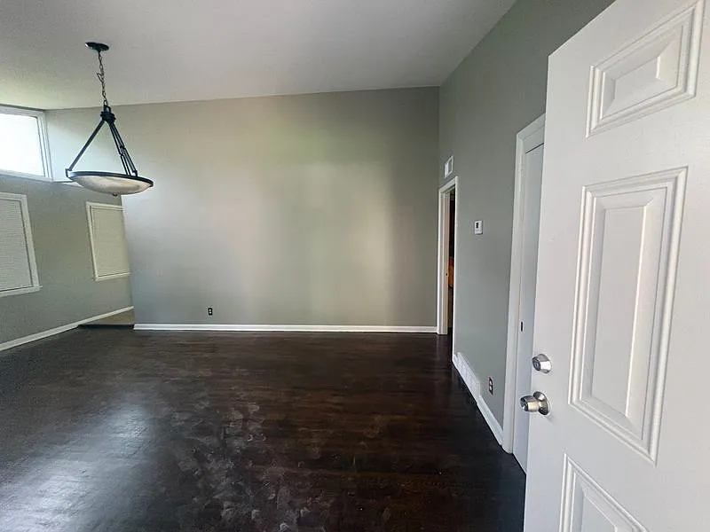 Charming 4-Bed Brick Home with Covered Patio & Spacious Living Areas — Photo 3