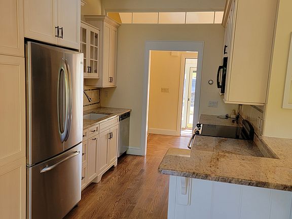 Nicely updated kitchen and lots of storage and granite counter tops