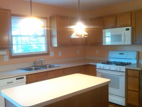 The kitchen island provides plenty of room to work.