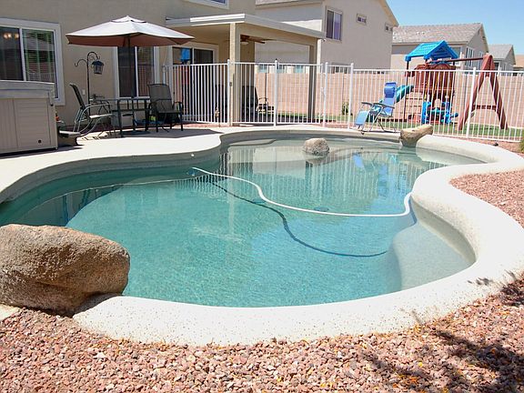 Low Maintenance Saltwater Pool, 6 person spa and a large grass play area!