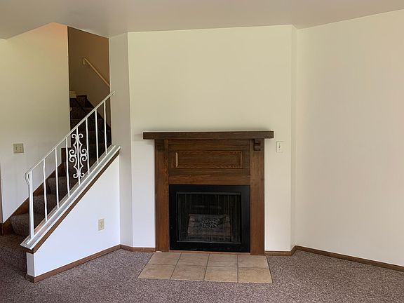 A nice feature is an eclectic fireplace in the living area.
