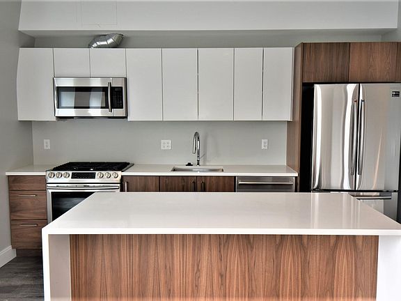 #407 Kitchen with Waterfall Island
