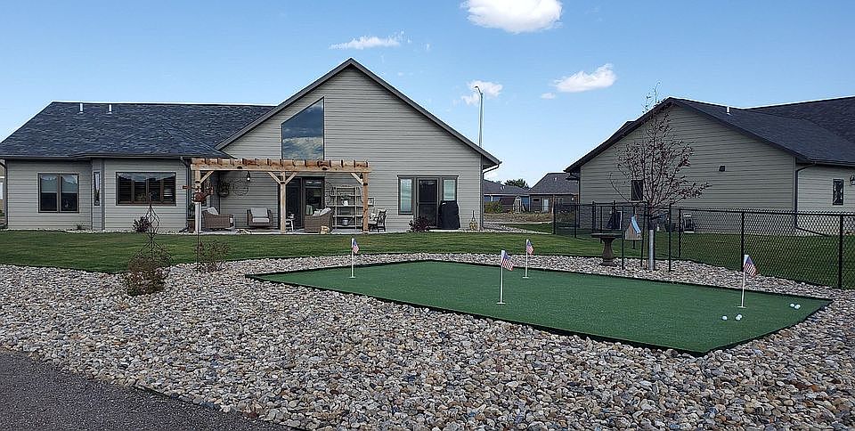 4 hole putting green in backyard