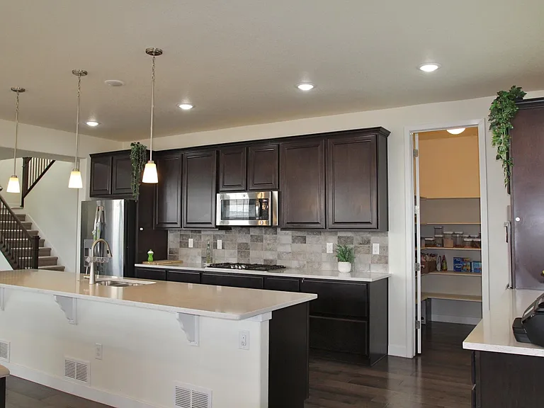Stainless steel appliances including gas cooktop