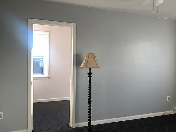 Bedroom leading into Bonus Room. New ceiling fan.