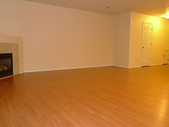 Living room, door on the right is entrance from Garage, door