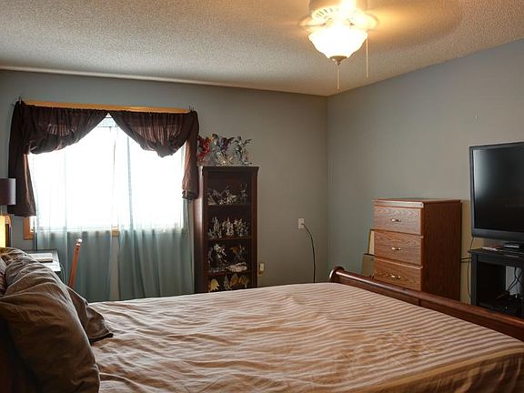 Another view of the Master Bedroom. Shows that there's plenty of space even with a chest and a tv in the room.