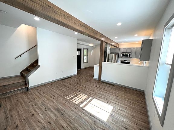 Living area with open concept kitchen