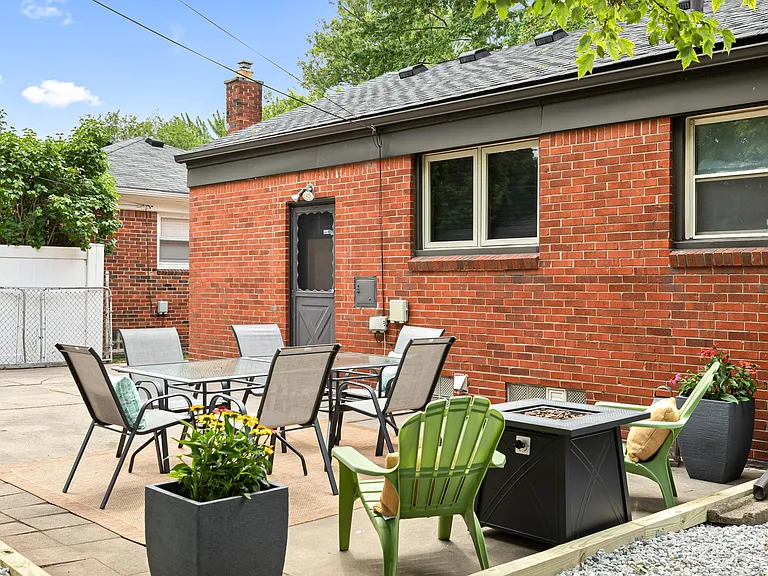 This spacious patio has enough space for everyone to relax and enjoy the outdoors.
