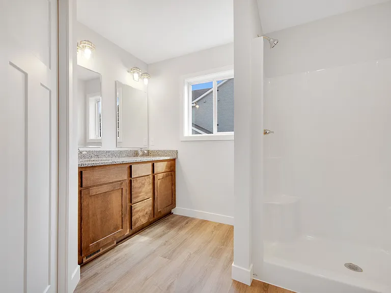 Master Bath With Step In Shower & Seat.