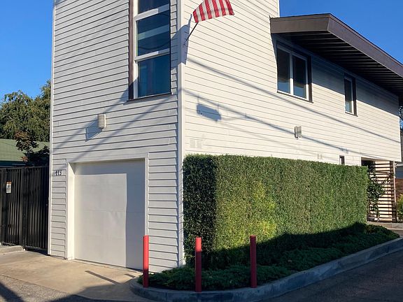 one car attached garage, living space above