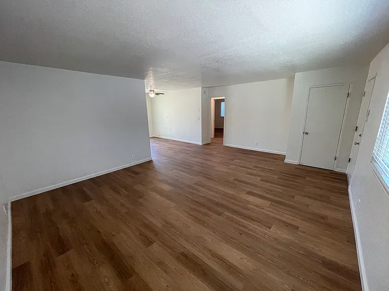 Family room with front entry door and entry closet.