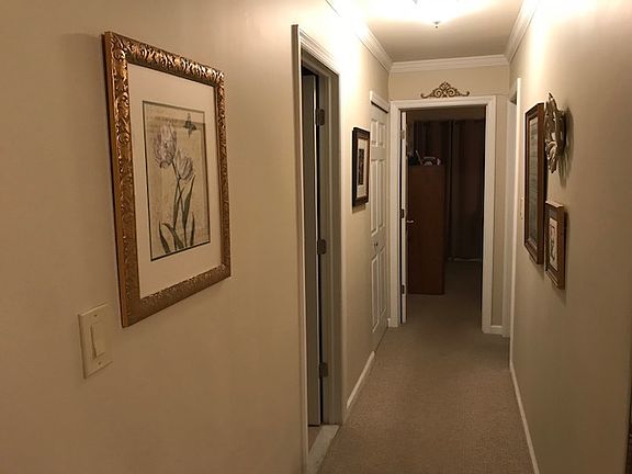 Hallway opens to BRs